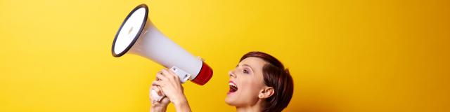 Female Model Using Bullhorn In Photo Session (5)